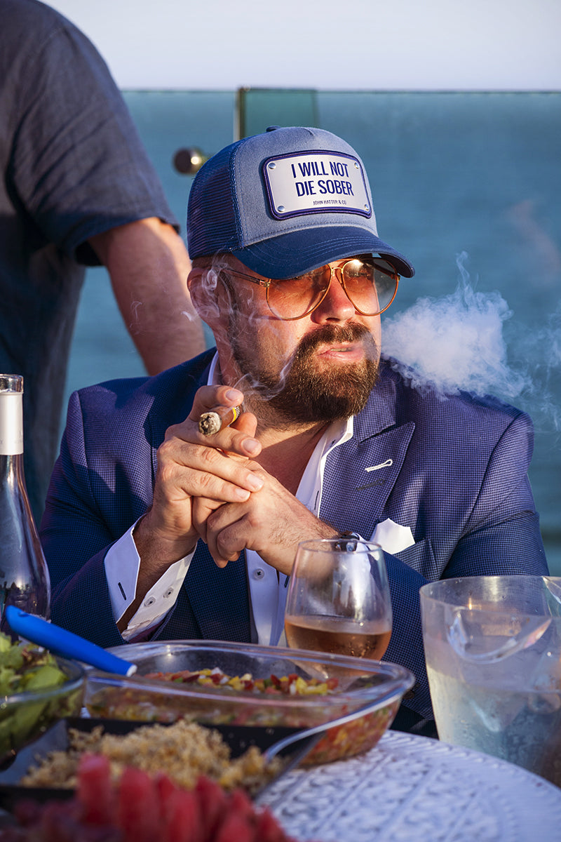 Photograph with the cap I will not die sober